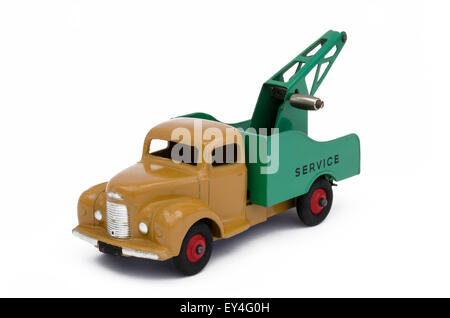 Vintage, brown and green toy towing truck. Isolated against a white background Stock Photo