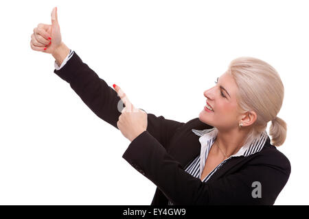 Close up Pretty Smiling Young Businesswoman Pointing Up with her Two Hands While Looking at the Camera. Isolated on White Background. Stock Photo