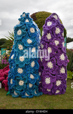 Big Flower at Tatton Park, Cheshire, UK 21st July, 2015.    Two Knitted woollen Delphiniums flowers at the RHS Flower Show. Stock Photo