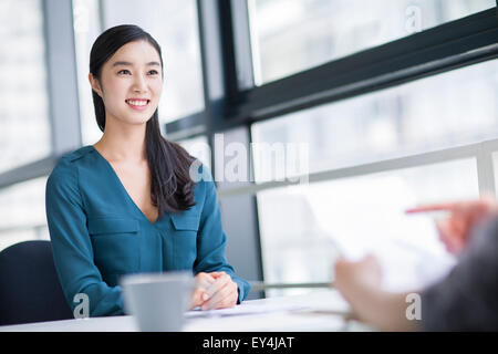 Young woman interviewing for a job Stock Photo