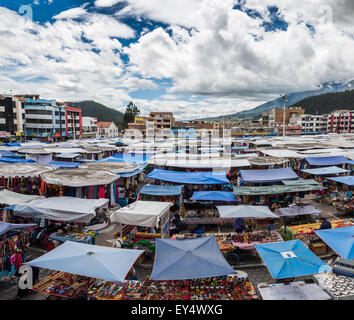 Weekend market at town center is an age-long tradition. Otavalo, Ecuador. Stock Photo