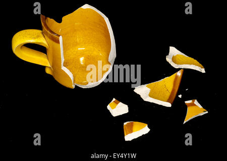 Broken Orange Coffe Cup Stock Photo