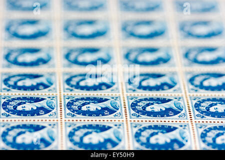 Sheet of British postage stamps. Circa 1950s, Queen Elizabeth 10d light blue 'wilding' definitive stamp issue. In use from 1952 to 1967. Iconic. Stock Photo