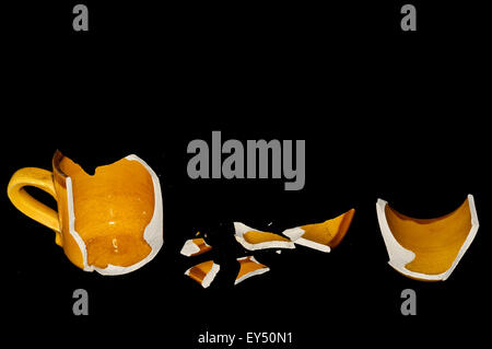 Broken Orange Coffe Cup Stock Photo