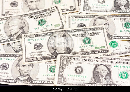 Background of US dollar bills, banknotes, various values. 1, 5, 10 and 20 bills. Cash, money. Stock Photo