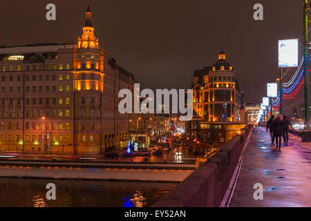 Hotel Baltschug Kempinski and Balchug street of Moscow viewed from the Large Mosckvoretsky bridge in winter Stock Photo