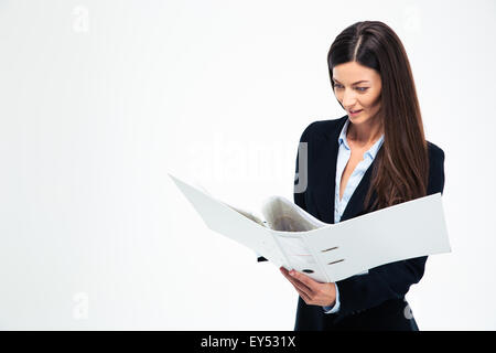 Happy businesswoman reading documents in folder isolated on a white background Stock Photo