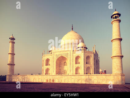 Vintage retro toned sunrise over Taj Mahal, India. Stock Photo