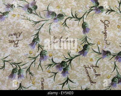 Cloth with thistles and Scottish towns listed Stock Photo