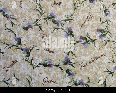 Cloth with thistles and Scottish towns listed Stock Photo