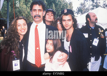 FRANK ZAPPA (1940-1993) US rock musician with his family including son Dweezil at right and wife Adelaide about 1980 Stock Photo