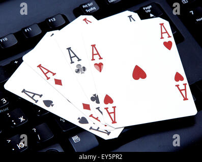 internet casino poker four of kind aces cards comdination hearts on keyboard Stock Photo