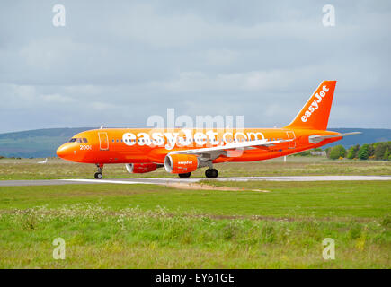 Easyjet 320-214 Airbus (G-EZUI) Civil Passenger Airliner arriving at Inverness.  SCO 9997. Stock Photo