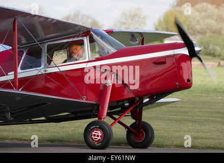 De Havilland DH87B Hornet Moth G-AELO taxiing at Breighton Airfield Stock Photo