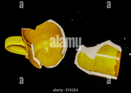 Broken Orange Coffe Cup Stock Photo