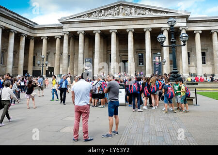 Tourists standing outside the British Museum in London. Stock Photo