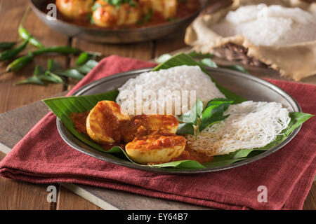 Egg curry and string hoppers. Sri Lanka and South India Food Stock Photo