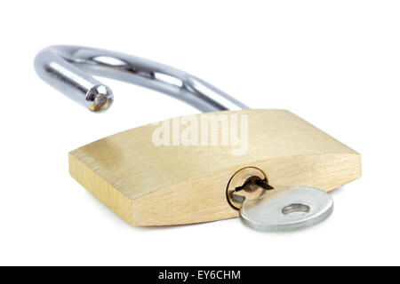 Close-up of an unlocked padlock with a key in the keyhole, isolated on white background Stock Photo
