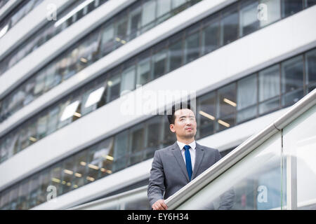 Businessman looking at view thinking Stock Photo