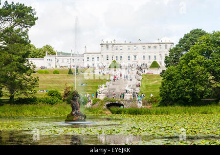 Visitors enjoying the front lawns and steps at Powerscourt, Ireland Stock Photo