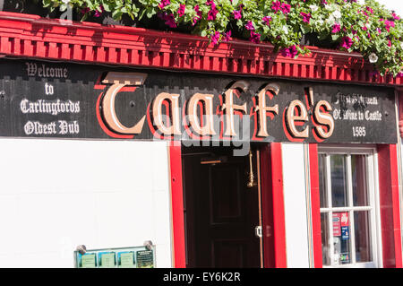 Sign for Taaffe's Castle, the oldest pub in Carlingford, Ireland Stock Photo