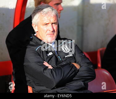 Wrexham, UK. 22nd July July, 2015. Stoke City manager Mark Hughes in the dugout ahead of the pre season friendly between Wrexham and Stoke City at The Racecourse Ground, Wrexham. Credit:  SJN/Alamy Live News Stock Photo