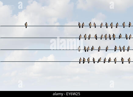 Individuality symbol and independent thinker concept and new leadership concept or individuality as a group of pigeon birds on a Stock Photo
