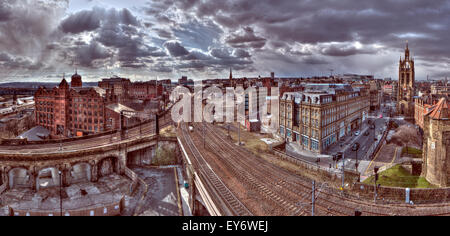 Panoramic landscape view of Newcastle upon Tyne's Central Station shot in HDR on an overcast summer daytime from the castle keep Stock Photo