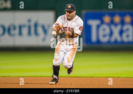Houston, TX, USA. 22nd July, 2015. Houston Astros second baseman Jose Altuve (27) fields a ground ball hit by Boston Red Sox shortstop Xander Bogaerts (2) during the 4th inning of a Major League Baseball game between the Houston Astros and the Boston Red Sox at Minute Maid Park in Houston, TX. Trask Smith/CSM/Alamy Live News Stock Photo