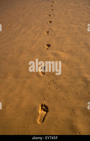 Australia, New South Wales, Central Coast, footsteps in the sand at Avoca Beach Stock Photo