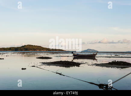 Sea with morning light and fishing boat, Rawai beach, Phuket Thailand Stock Photo