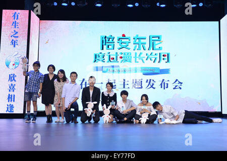 Beijing, China. 23rd July, 2015. Cast members of film 'A Journey through Time with Anthony' pose for a photo at a press conference in Beijing, capital of China, July 23, 2015. The film will be on screen on October 16. Credit:  Jin Liangkuai/Xinhua/Alamy Live News Stock Photo