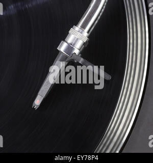 Dj needle stylus on spinning record, closeup Stock Photo