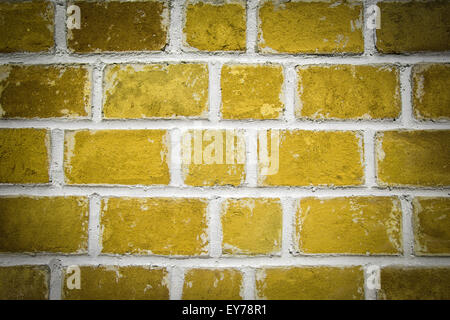 Yellow brick wall background, closeup Stock Photo