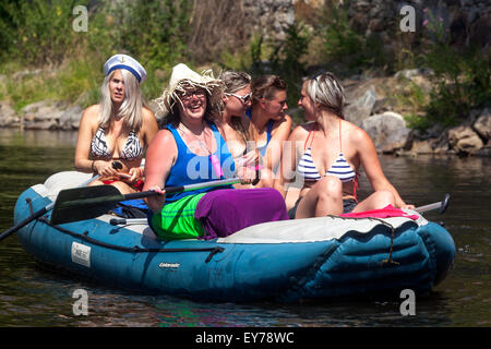 Summer vacation, People Women ride by the river Vltava, rafting, South Bohemia, Czech Republic Stock Photo