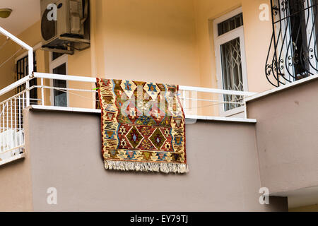 carpet   hanging on balcony Stock Photo