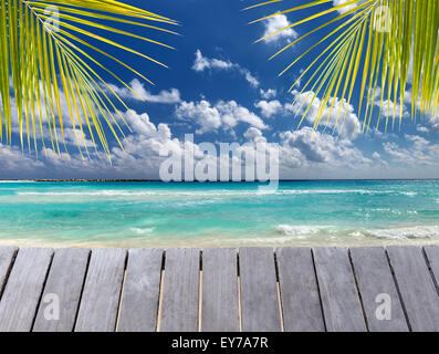 Wooden pier on caribbean beach view Stock Photo