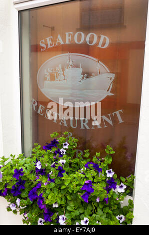Window of The Fleet Inn Seafood Restaurant grill, Killybegs, County Donegal, Ireland Stock Photo