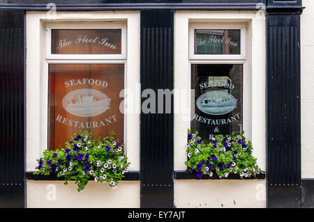 Windows of The Fleet Inn Seafood Restaurant grill, Killybegs, County Donegal, Ireland Stock Photo