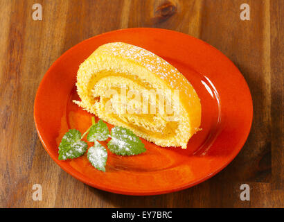 Swiss roll with peanut butter cream filling Stock Photo