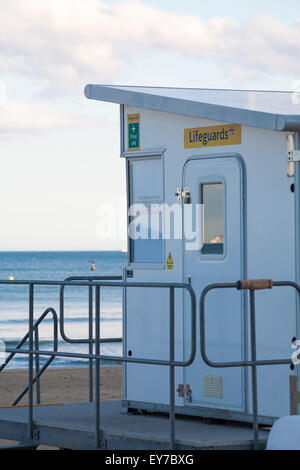 RNLI lifeguards kiosk on a summer evening at Sandbanks, Poole, Dorset UK in July Stock Photo