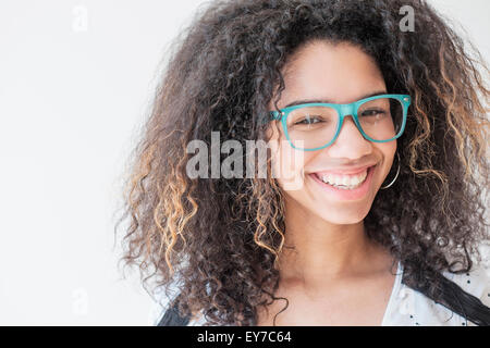 Portrait of teenage girl (16-17) wearing eyeglasses Stock Photo