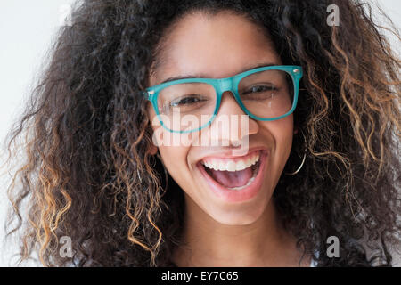 Portrait of teenage girl (16-17) wearing eyeglasses Stock Photo