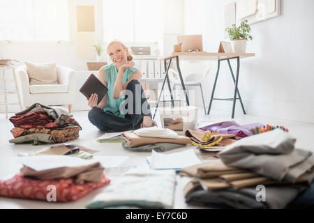 Design professional working in living room Stock Photo
