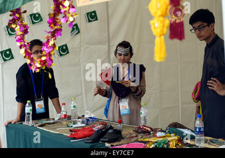 Beijing, China. 23rd July, 2015. Campers from Pakistan exhibit their culture in Beijing, capital of China, July 23, 2015. The 6th Soong Ching Ling International Summer Camp, sponsored by China Soong Ching Ling Foundation, began in Beijing Thursday, and will last till July 29. © Jin Liangkuai/Xinhua/Alamy Live News Stock Photo
