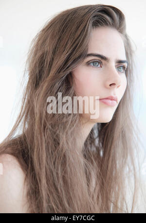 Portrait of young woman with blue eyes Stock Photo
