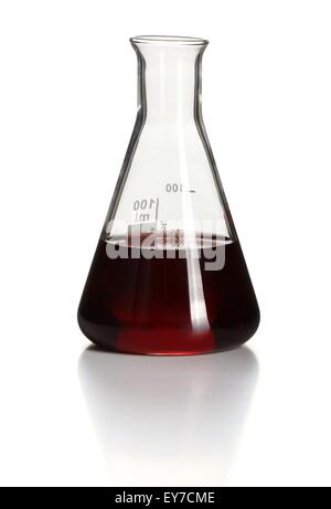 Erlenmeyer flask with red liquid chemical solution inside Stock Photo