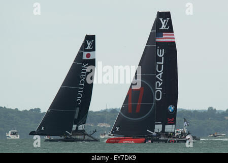 Portsmouth, UK. 23rd July 2015. Oracle Team USA and Softbank Team Japan in a practice start during the Parade of Sail on day one of the America's Cup. Credit:  MeonStock/Alamy Live News Stock Photo