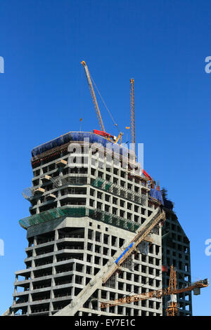 Construction site of new tower building from reinforced concrete. Stock Photo