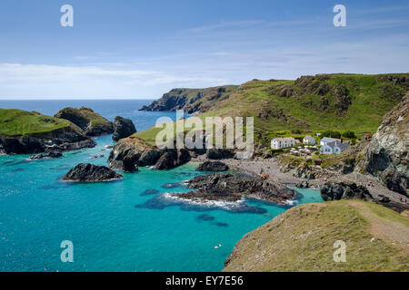 Kynance Cove beach, Cornwall, England, UK - with cafe and coastline at high tide Stock Photo